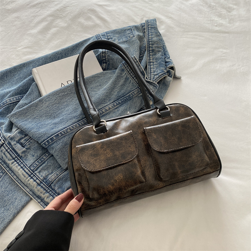 Bolsos para axilas de gran capacidad para viajeros otoño e invierno nueva moda retro nicho bolso de hombro casual de varios bolsillos