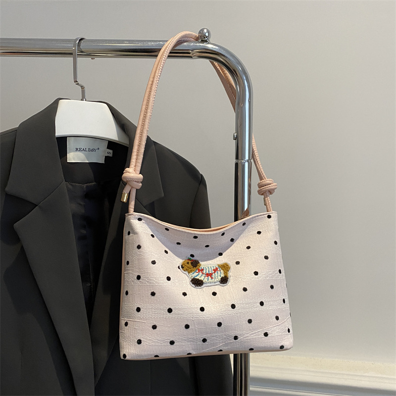 Bolsa de lona popular de este año para mujeres 2024 nuevo bolso de balde de verano de gran capacidad de alta calidad sensación de mochila de viaje