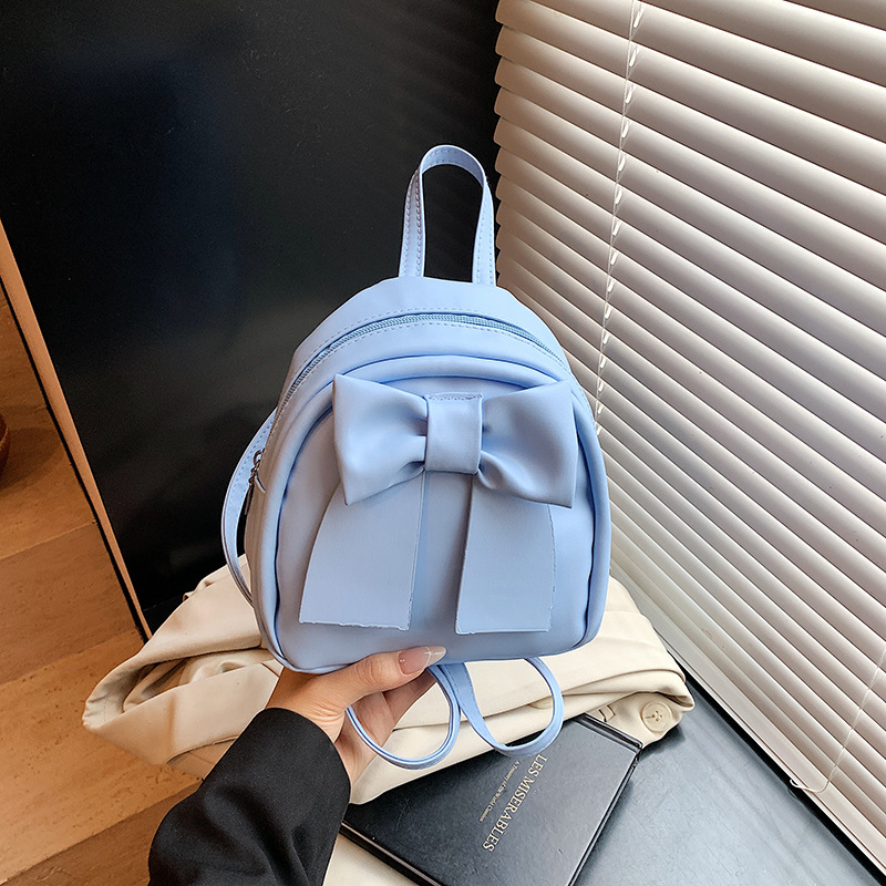 Lindo bolso pequeño con lazo simple 2025 verano nuevo estilo diseño sentido mochila pequeña moda estilo occidental mochila salvaje