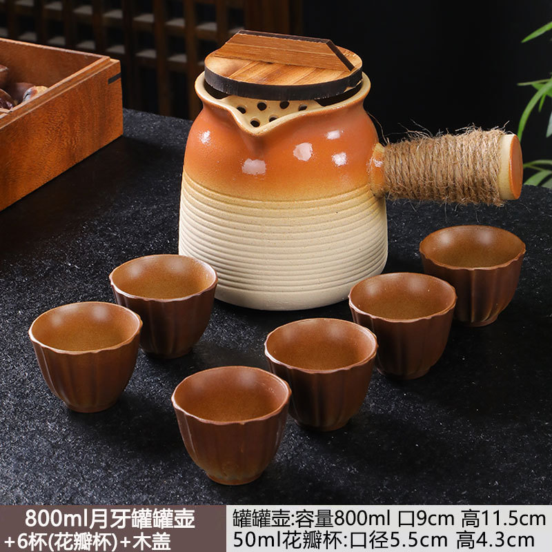 Tetera en una estufa, tarros de té con leche a la parrilla, ollas especiales, utensilios de cerámica de cocción en seco para el hogar, juego completo de juegos de té