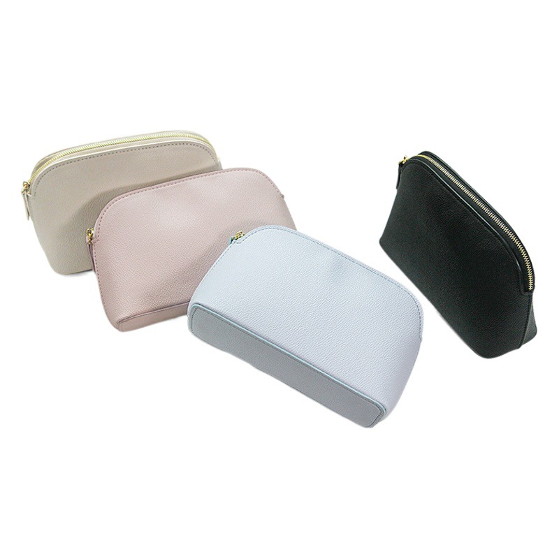 2024 nueva bolsa de cosméticos de alta gama textura de cuero Shell embrague exquisita cena portátil almacenamiento bolsa de cosméticos