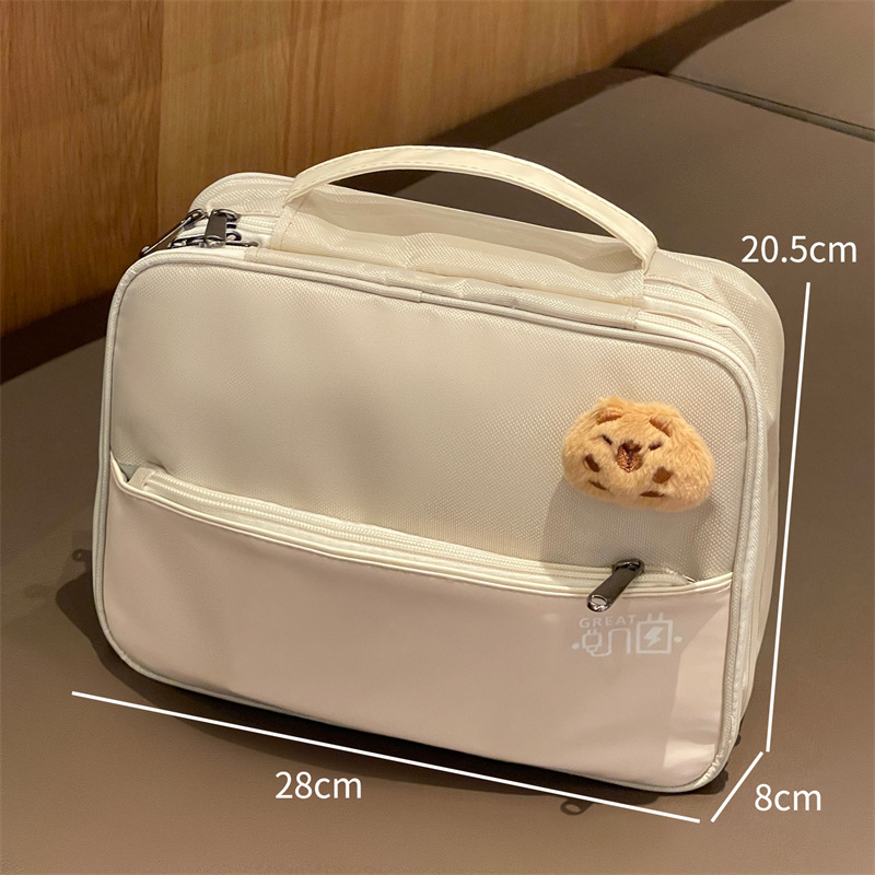 Nueva bolsa de maquillaje de gran capacidad multifuncional para salir bolsa de lavado portátil de alto valor facial bolsa de almacenamiento de maquillaje impermeable de tres capas