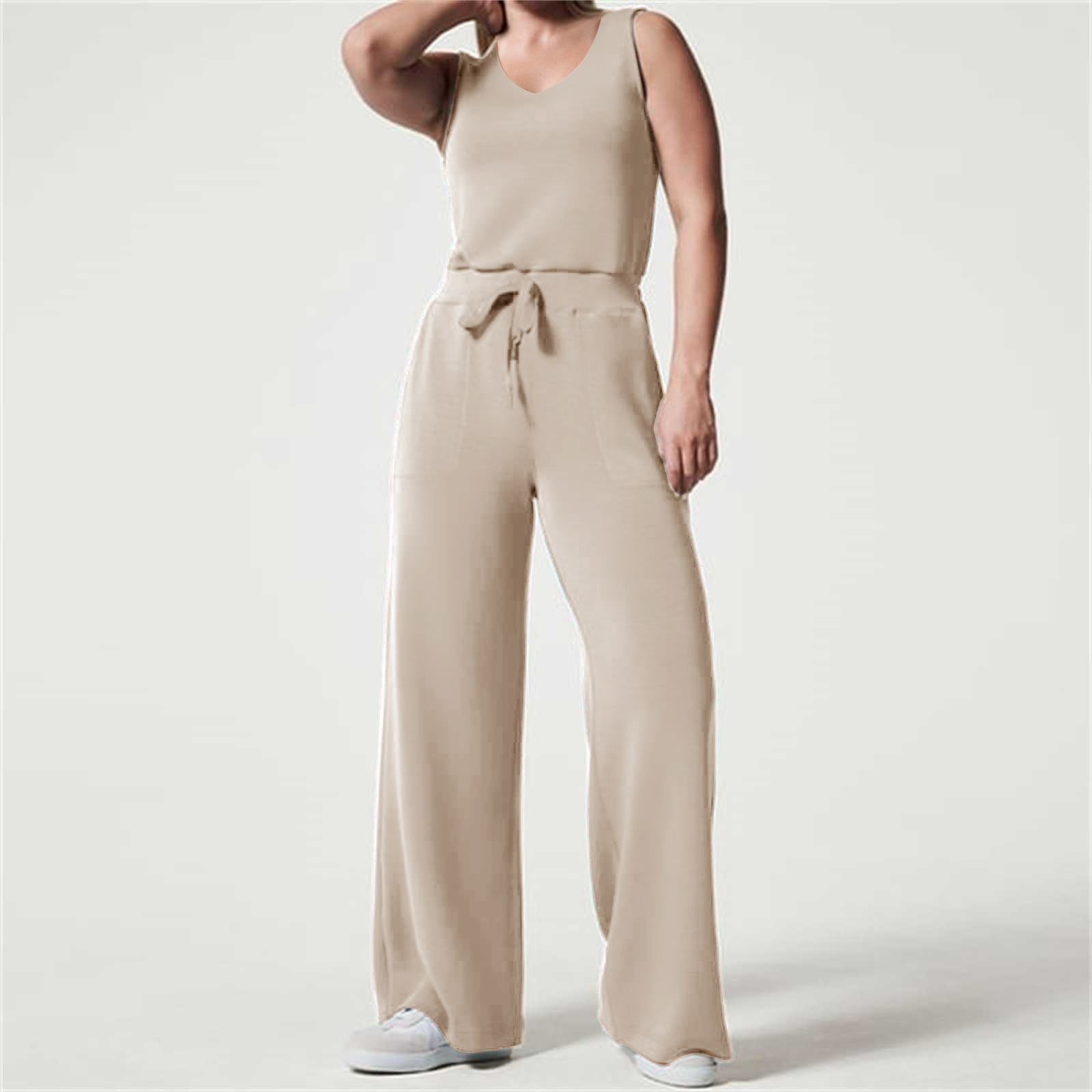 2023 primavera y verano nuevo versátil moda europea y americana adelgazamiento ocasional de las mujeres sin mangas color sólido V-cuello pantalones jumpsuit