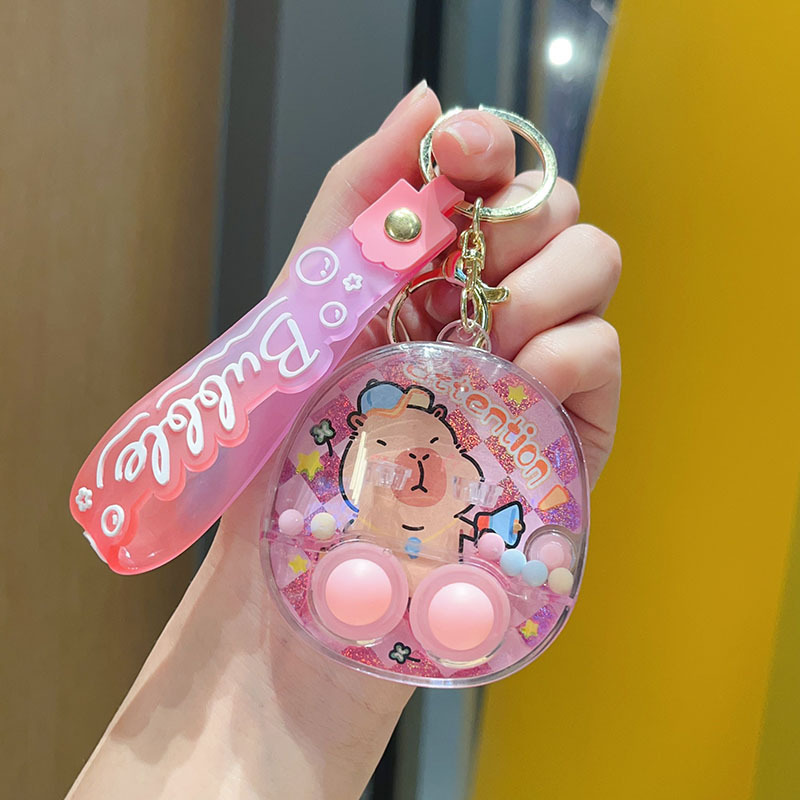 カピ水中シューティングゲーム機キーホルダークレヨンしんちゃんかわいい液体携帯ゲーム機ギフトペンダント|undefined