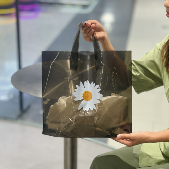 厂家批发EVA底折太阳花超透手提袋服装店加厚包装礼品塑料袋现货