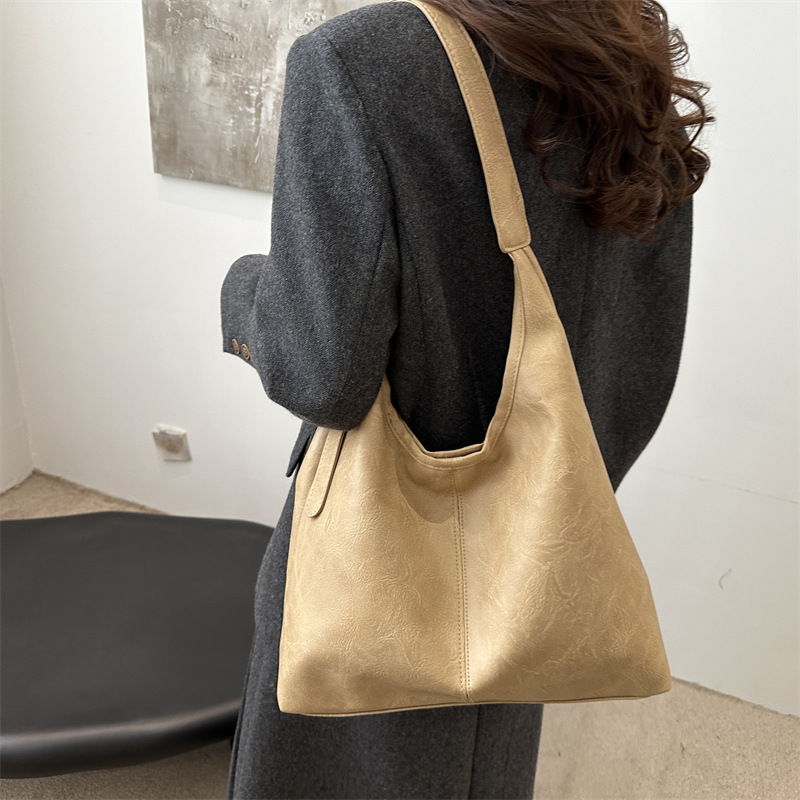 2025 primavera nueva moda bolsos de mano de hombro de gran capacidad bolsos tote bolsos de mujer bolsos de viaje bolsos versátiles para mujeres
