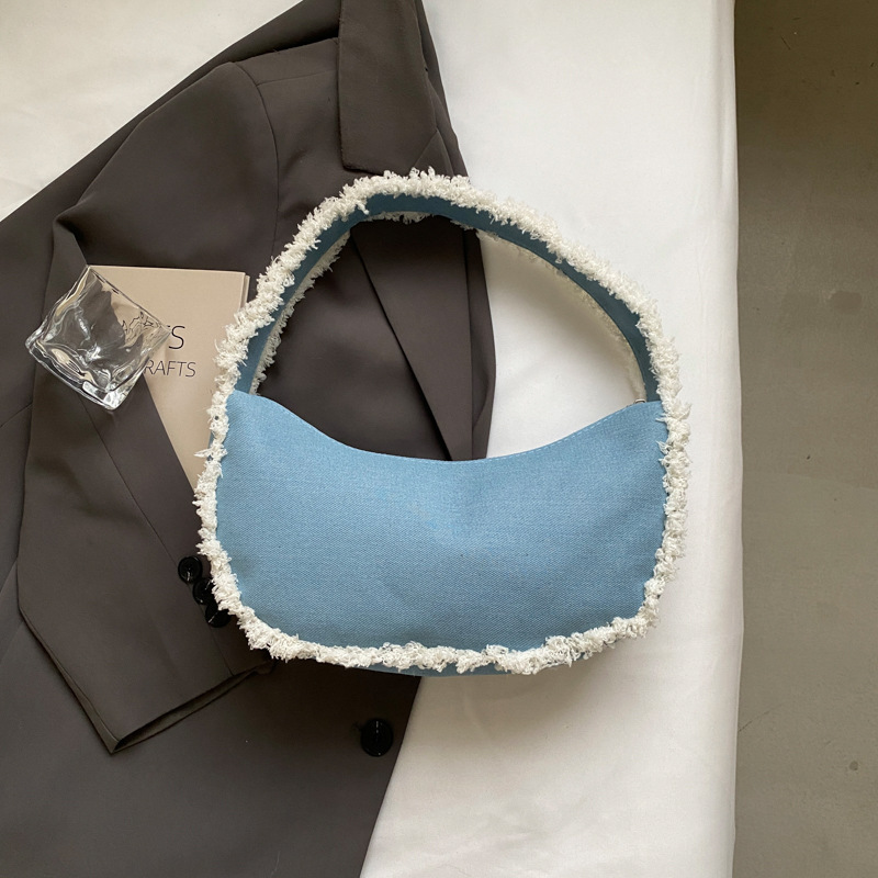 Bolso de axila de nicho coreano para mujer otoño e invierno 2024 nueva moda de moda silla de felpa bolso de hombro de mezclilla casual