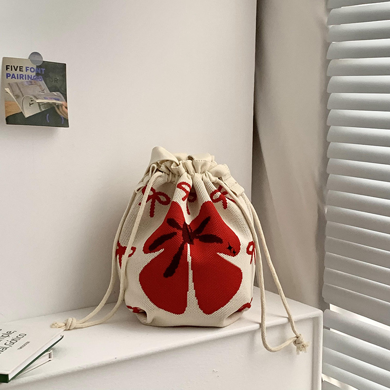 Bolsa de cinturón versátil nuevo patrón de dibujos animados nicho lindo bolso de arroz de almuerzo de cuerda bolso de cubo de mano bolso de brazo