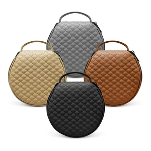 Car CD case with embroidered plaid pattern, a storage bag for CDs, suitable for both home and car use, featuring a leather-edged design and a round shape