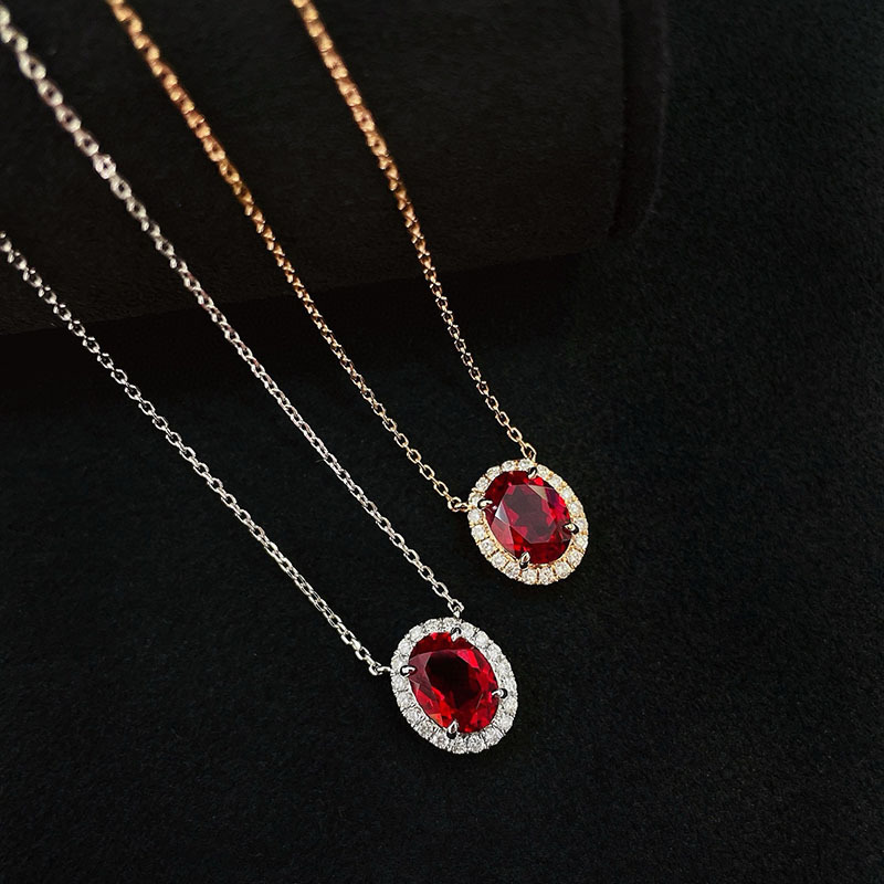 18K gold cultured ruby and diamond necklace for women, 1-carat pendant, surrounded by a diamond-encrusted choker in gold and rose gold.
