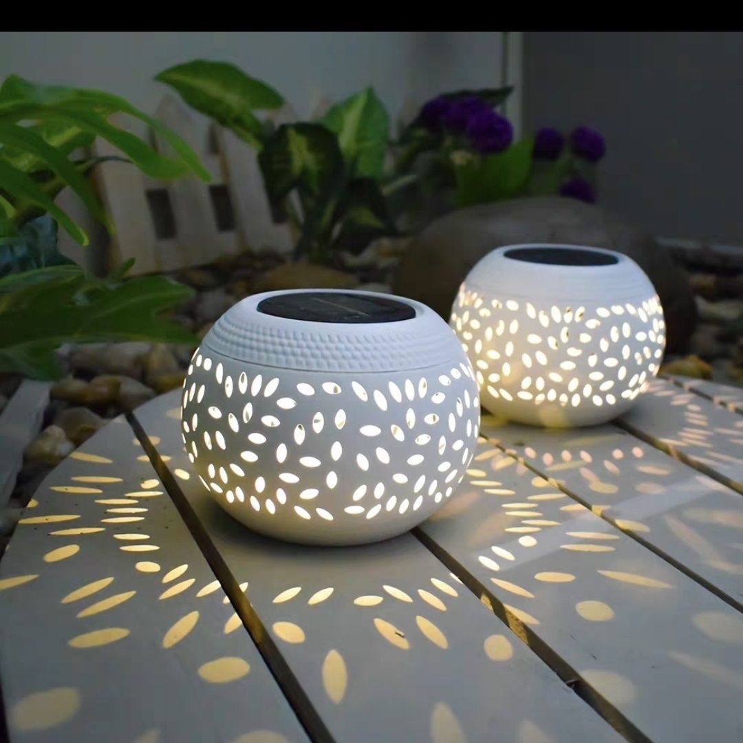Lámpara solar de hierro forjado al aire libre transfronteriza lámpara de hoja de césped hueco lámpara de jardín decoración lámpara de paisaje lámpara de frasco solar