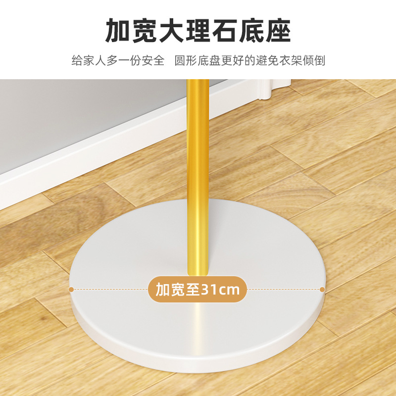 Floor-standing coat rack for bedrooms, minimalist and modern design—popular online clothes rack ideal for hanging garments at home or in the living room, plus a convenient bag-hanging shelf.