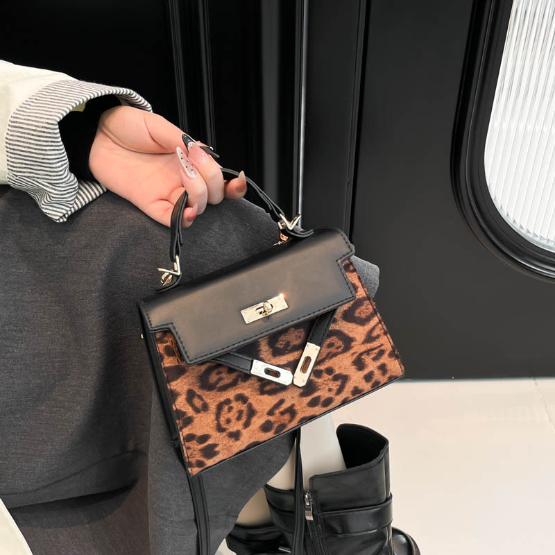 Bolso de impresión de leopardo retro 2026 invierno nuevo estilo de moda bolso Kelly nicho de alta calidad bolso de hombro universal