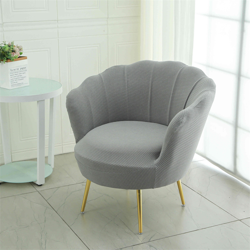 Cubierta de silla de pétalo nuevo jacquard elástico Four Seasons Universal maquillaje silla palillos cubierta arco anti-gato cero