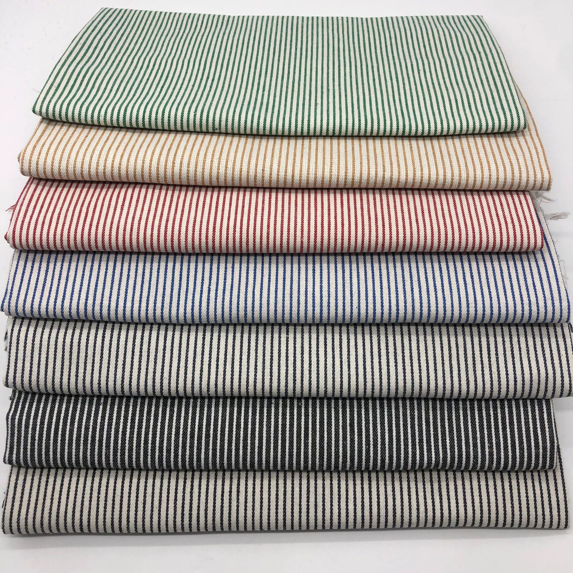 现货涤棉斜纹条子色织面料条纹梭织面料桌布抱枕手袋箱包沙发布料