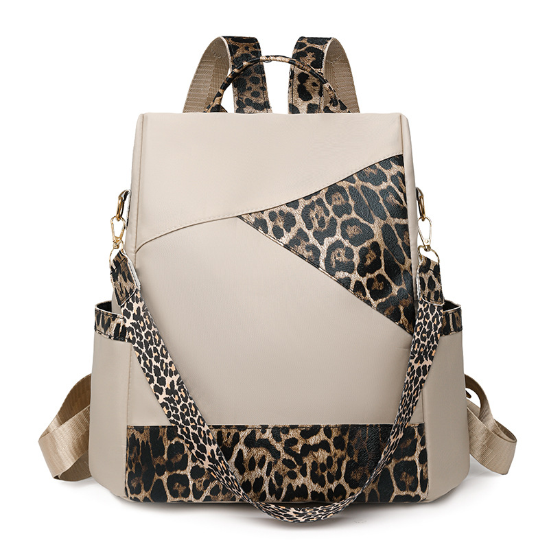 Nueva mochila con estampado de leopardo para mujer 2024 nueva mochila de viaje de todo fósforo de moda de gran capacidad mochila escolar para estudiantes de un solo hombro