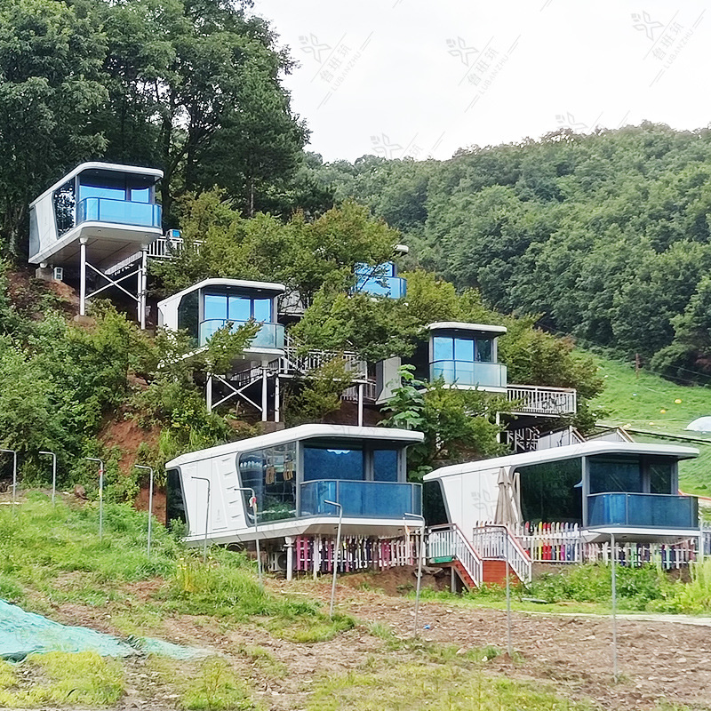 Cliff Hotel anti-sísmico a prueba de viento estructura de acero espacio inteligente cápsula habitación Internet celebridad nuevo aislamiento de aluminio B & B