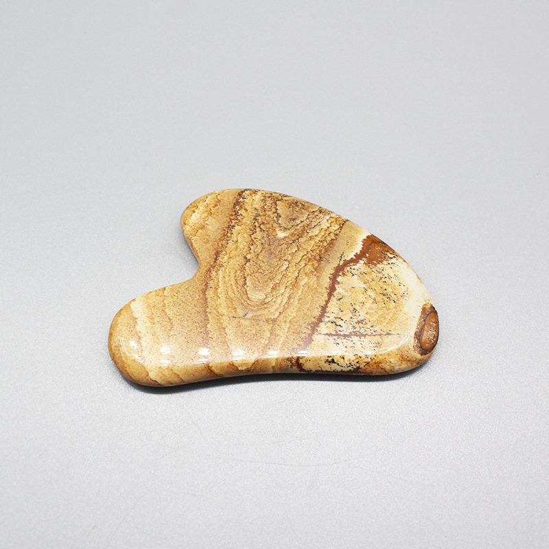 Tablero raspador de jade de cristal rosa natural Tablero raspador de belleza facial de cristal Meridian