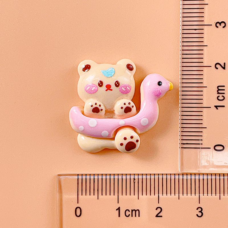 Mochila de dibujos animados fresa conejo pato anillo de natación oso accesorios de resina DIY crema pegamento agujero hebilla de zapato accesorios para el cabello material al por mayor