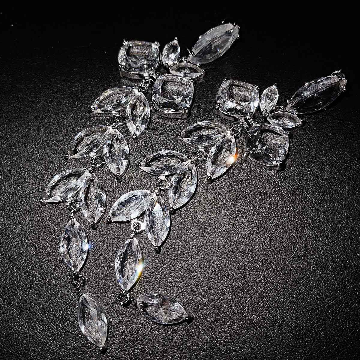 Moda Europea Y Americana Clásica Pétalo Largo Ojo De Caballo Borla Pendientes Mostrar Cara Delgada Internet Celebridad Completo Diamante De Imitación Zircon Hoja-shaped Pendientes De Perno display picture 10