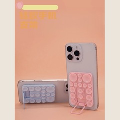 新型シリコン吸盤携帯電話スタンド吸盤携帯電話スタンド携帯ケース背面貼付スタンド汎用折り畳みスタンド