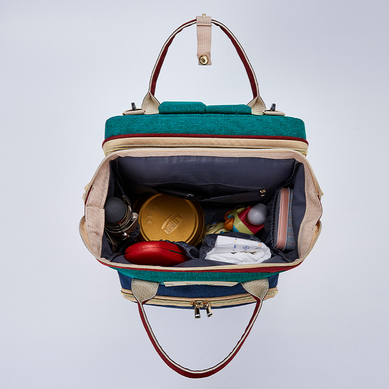 Cross-border new upgraded version folding bed mom bag, dual-use large capacity multi-functional portable baby bag foldable bed