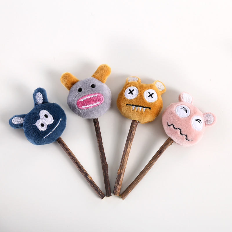 Mascota gato dientes molares limpieza auto-Hola pequeño monstruo campana de peluche juguete de madera cielo Liao piruleta mordedura palo