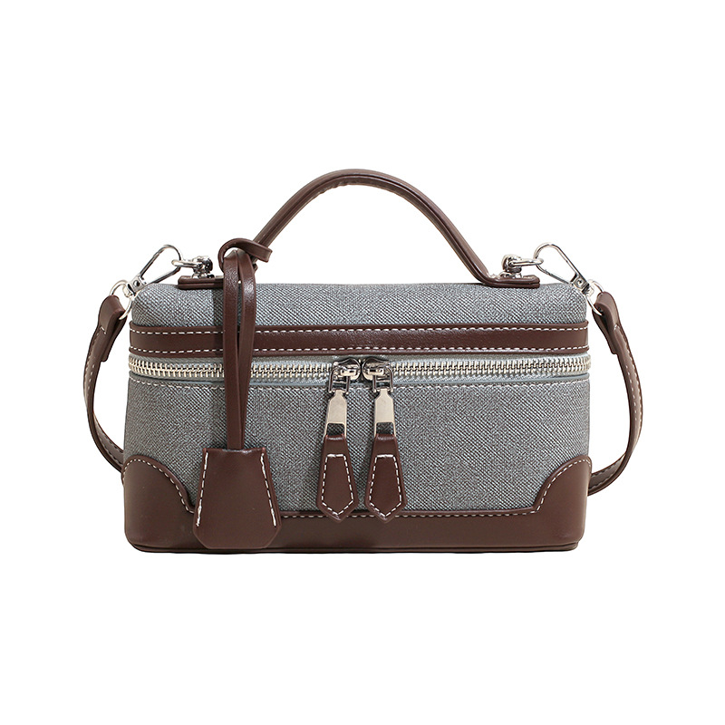 Caja de mano retro europea y americana bolsos pequeños cuadrados de mujeres nuevas ventas calientes transfronterizas pu color de empalme de hombro único bolso de tramo inclinado