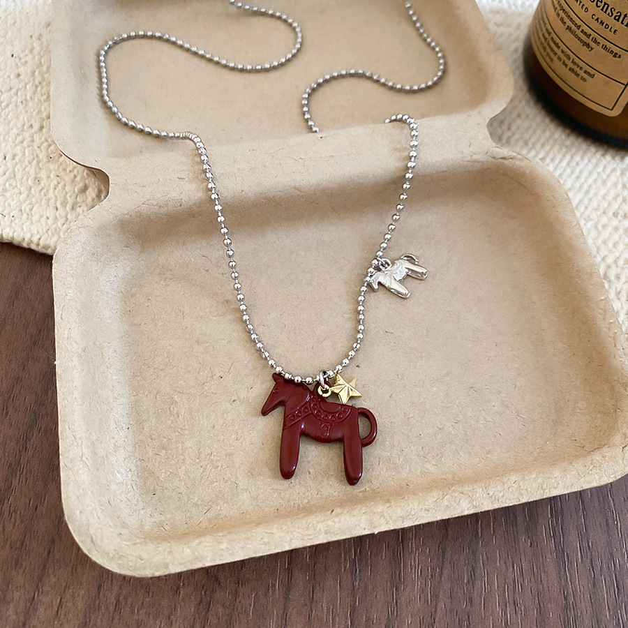 Oro verdadero eléctrico galvanis colgante de piedra pony pendientes collar ligero lujo nicho universal conjunto temperamento alta sensación de joyería mujer