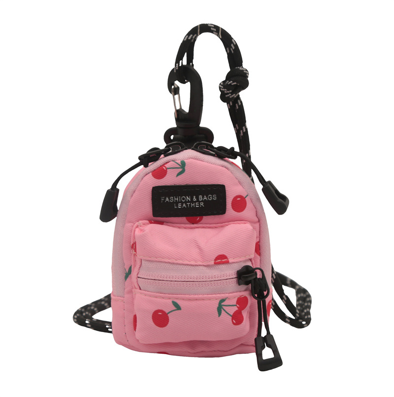 Mini bolso para niños coreano comercio exterior popular leopardo chica mochila de hombro bolso de auriculares de viaje al aire libre bolso de lápiz labial