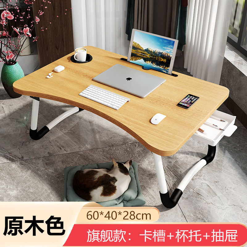 ノートパソコンの机の上で折り畳みます。|undefined