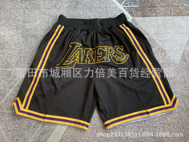 Comercio exterior pantalones de fútbol al por mayor Warriors Lakers 76 caliente Raptor mágico bolsillo bordado pantalones cortos pantalones de baloncesto NFL