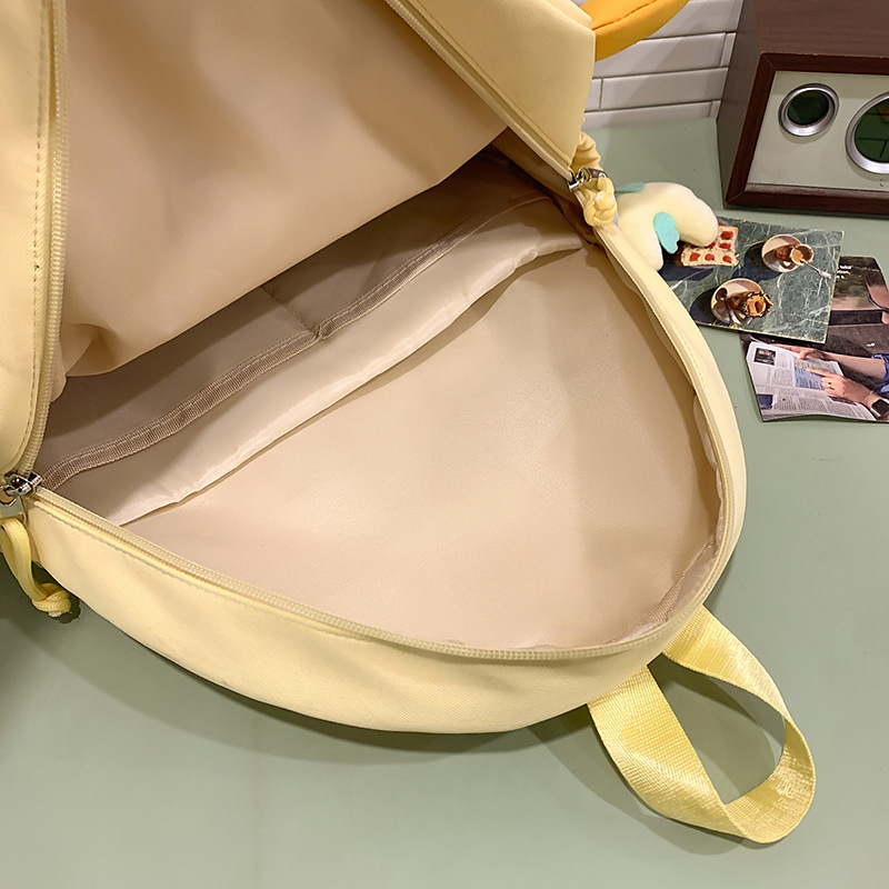 2025 nueva mochila escolar mochila ligera mochila niña lindo jardín de infantes mochila pequeña bolsa de dibujos animados casuales