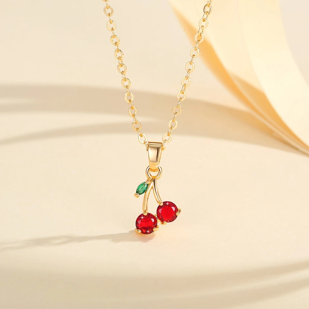 Moda transfronteriza encantadora o colgante de cadena de cereza colgante de cadena de clavícula nicho de diseño sensación de conjunto de auriculares de rubí