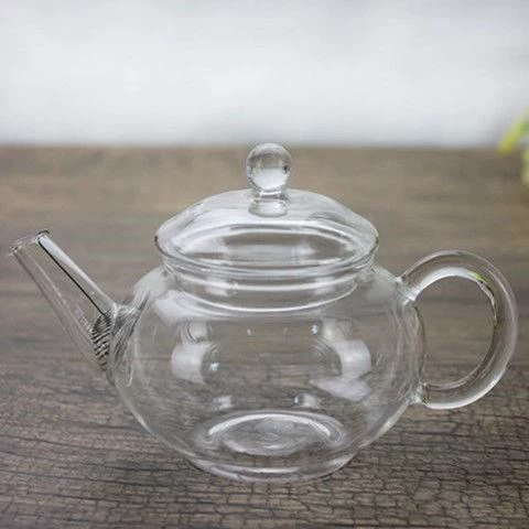 Стеклянный маленький чайник, ароматизированный чай, набор чая