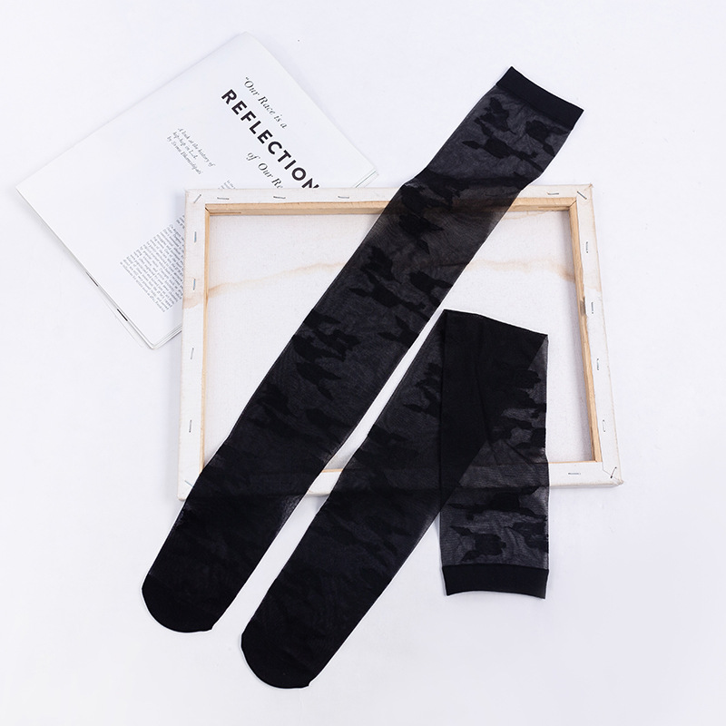 Calcetines por encima de la rodilla de las mujeres ins medias de flores grandes delgadas transparentes estilo JK medias blancas y negras atractivas del color sólido al por mayor