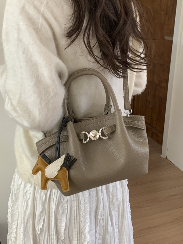 La versión coreana de nicho portátil bolso de cubo de agua para mujeres ventas calientes nuevas moda de alta calidad lichi pattern mochila de hombro de moda