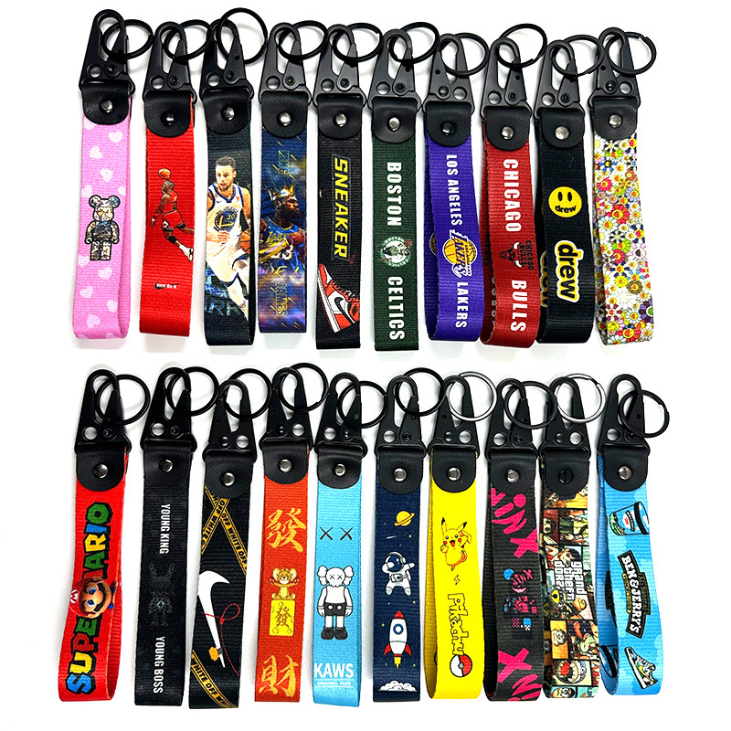 Fashion brand Eagle mouth buckle Pikachu R Star spaceman astronaut Jordan KAW head word d fashion keychain pendant