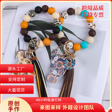 跨境热销西部风硅胶串珠PU流苏木制牛配件钥匙扣包包挂件女士手链