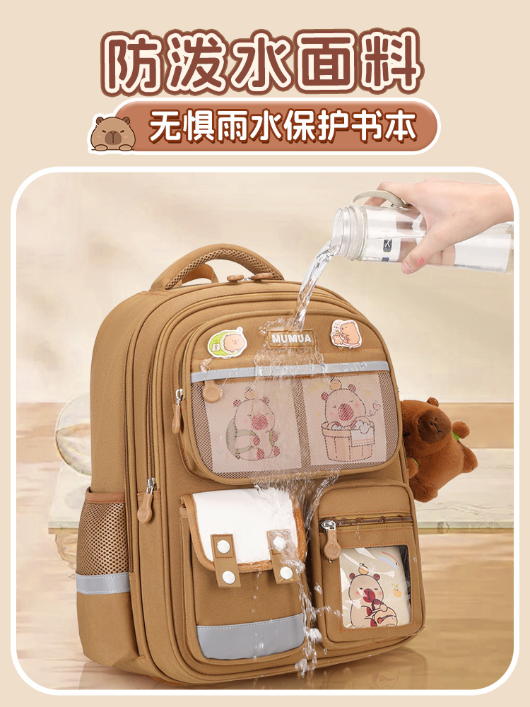 Las nuevas mochilas escolares para niños del compartimento de Kapibalado, las niñas, los niños y los estudiantes de primaria reducen la carga y son livianas, de uno, dos, tres a seis años.