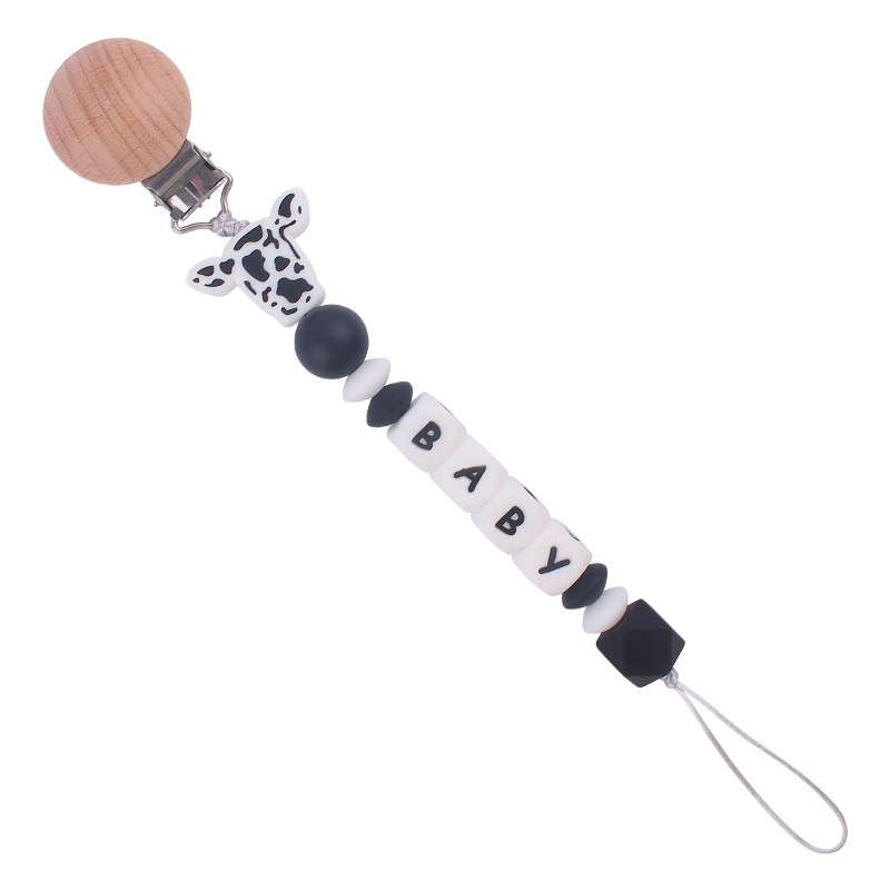 Nuevo bebé suministros de dibujos animados de silicona vaca cabeza mordedor creativo bebé DIY nombre mordedura pezón cadena anti-caída