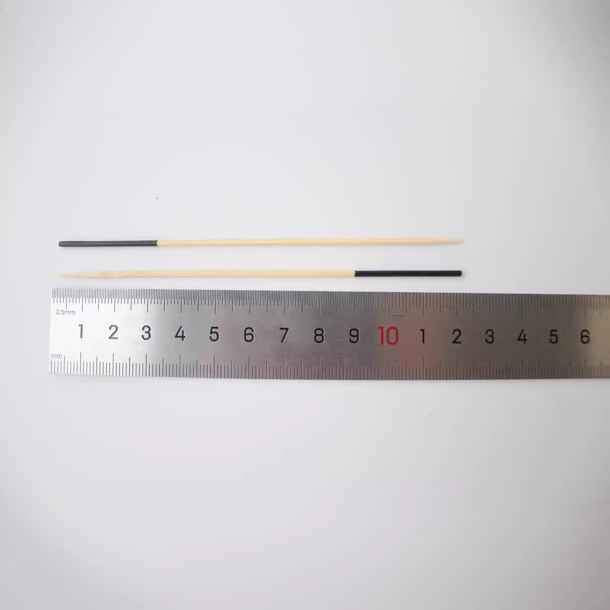 Fábrica de frutas de color palillo de dientes largo desechable hogar portátil enchufe de fruta de bambú restaurante sola cabeza flor palo multi-especificación