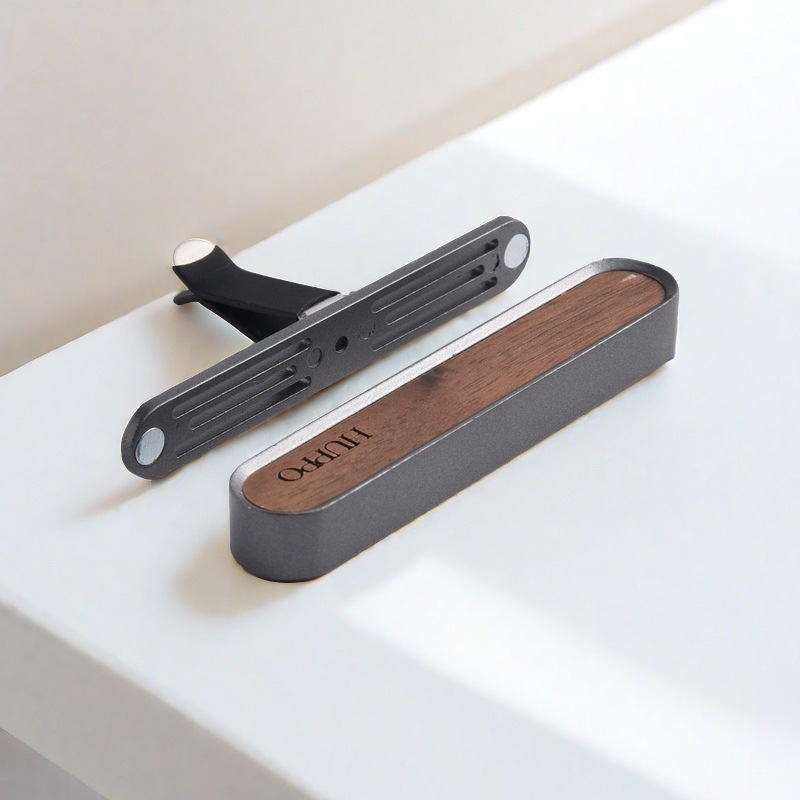 Alta sensación de madera de nuez de automóvil aromático de madera sólida de alta calidad aire acondicionado interior ventilador de ventilación de perfumes de botón aromático