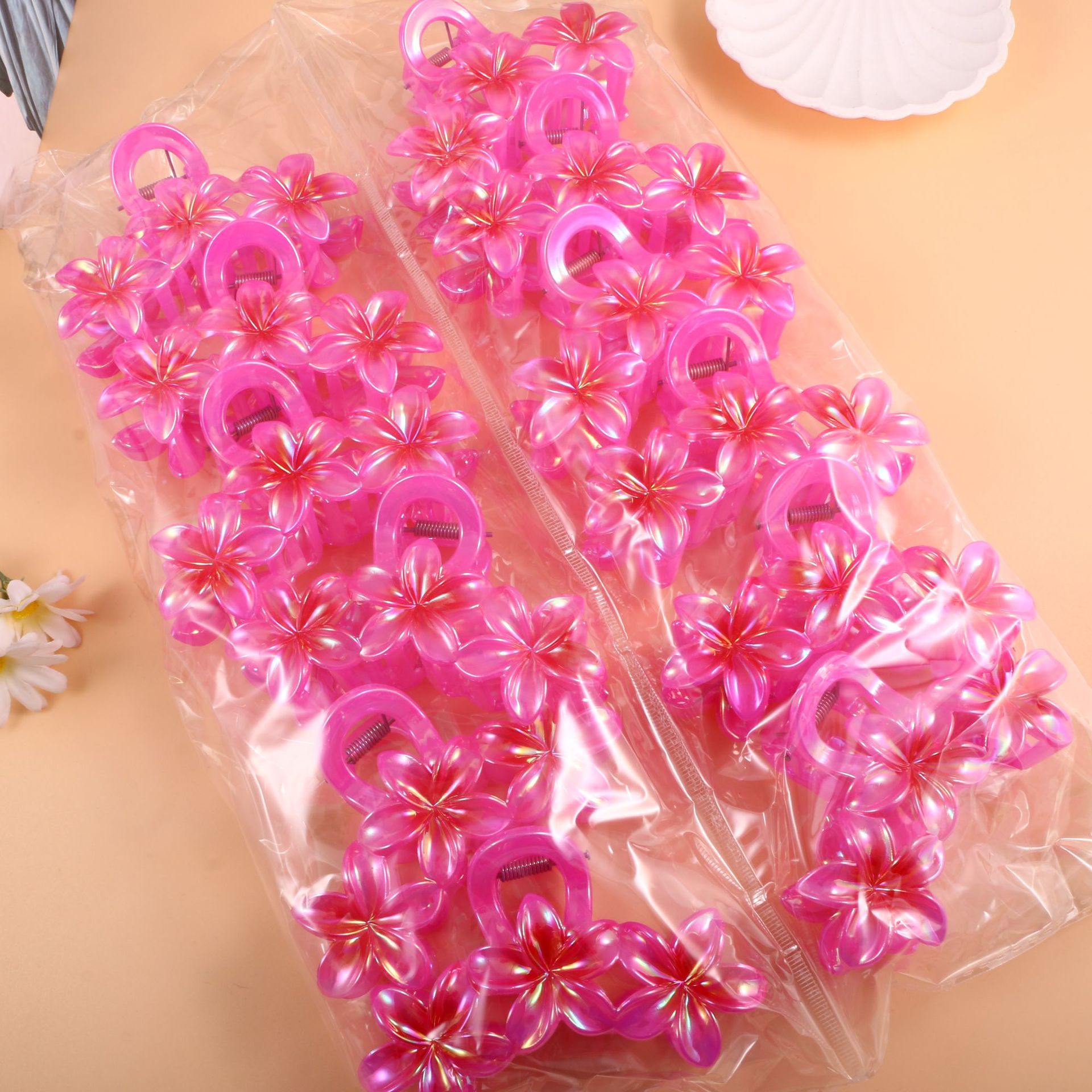 Nuevo color frangipani acrílico pinza para el cabello flor pinza de agarre de alta calidad elegante accesorio para el cabello de mujer pinza de tiburón de agarre lateral