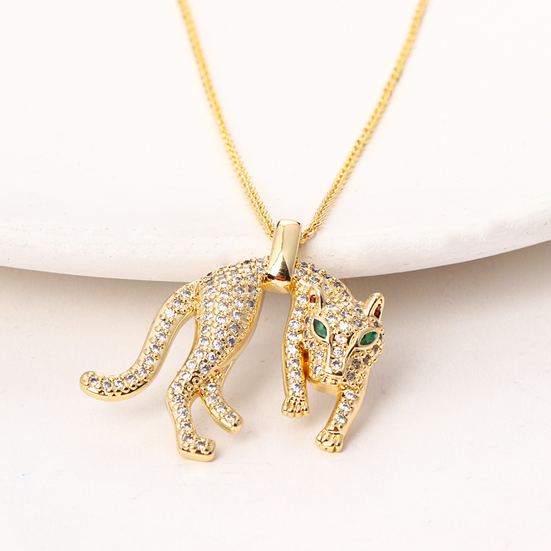 Nouveau collier polyvalent personnalisé hip-hop avec pendentif léopard en zircon et diamants, plaqué cuivre, véritable or transfrontalier, style hip-hop_voghion.com