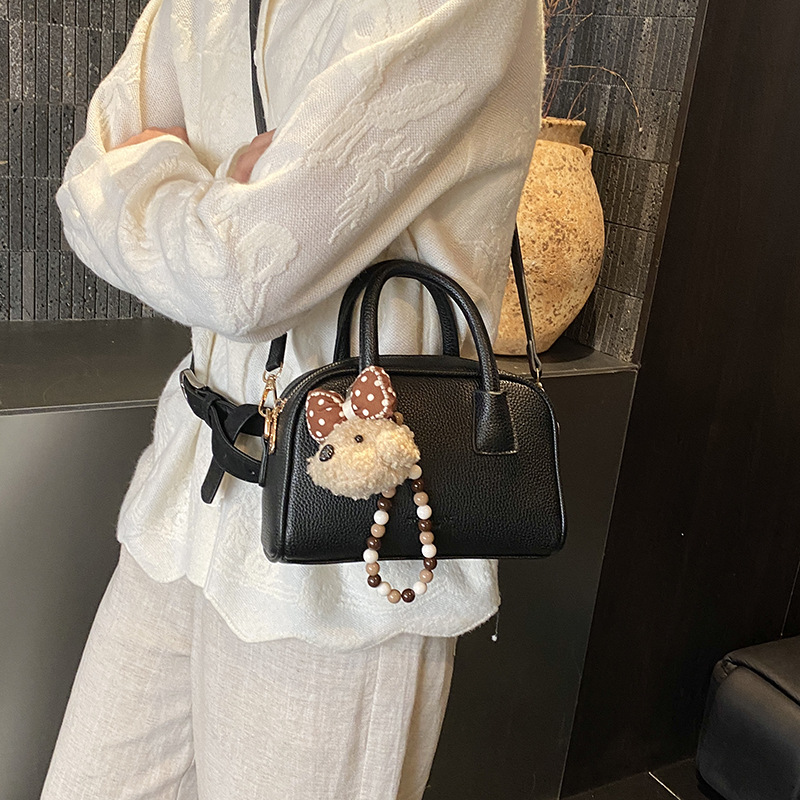 Niche Zhong bolso de almohada portátil para mujeres 2026 nuevo bolso de hombro bolso coreano bolso conchas de litchi