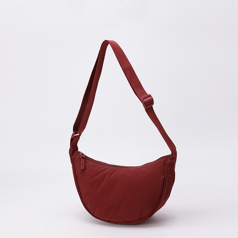 Bolso de tela pequeño bolso de moda ligero bolso de mochila de nylon transfronterizo mujer bolso de hombro casual versátil bolso de bolsas de bolsas de bollo de gran capacidad