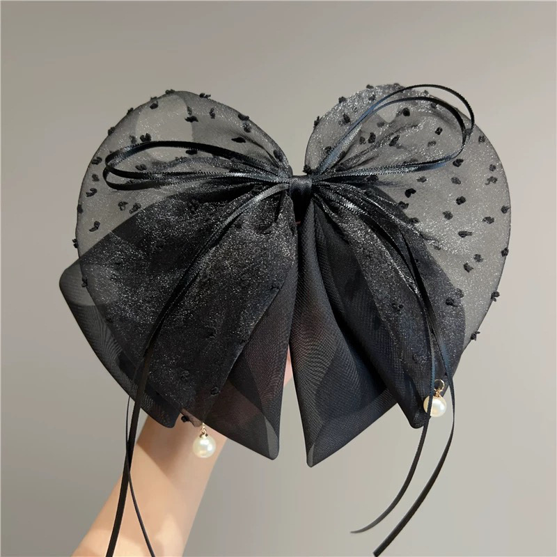 Черный хвостик с бантиком