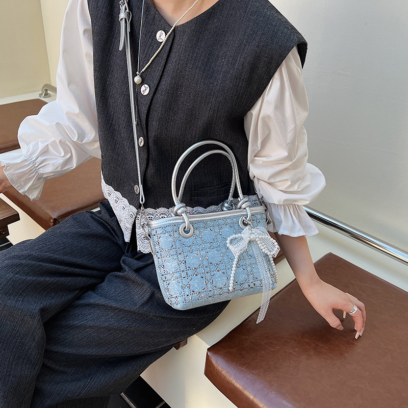 Transfronterizo coreano estilo extranjero simple bolso de cubo 2025 nuevo estilo de transporte de textura bolso de hombro de moda universal bolso de mano