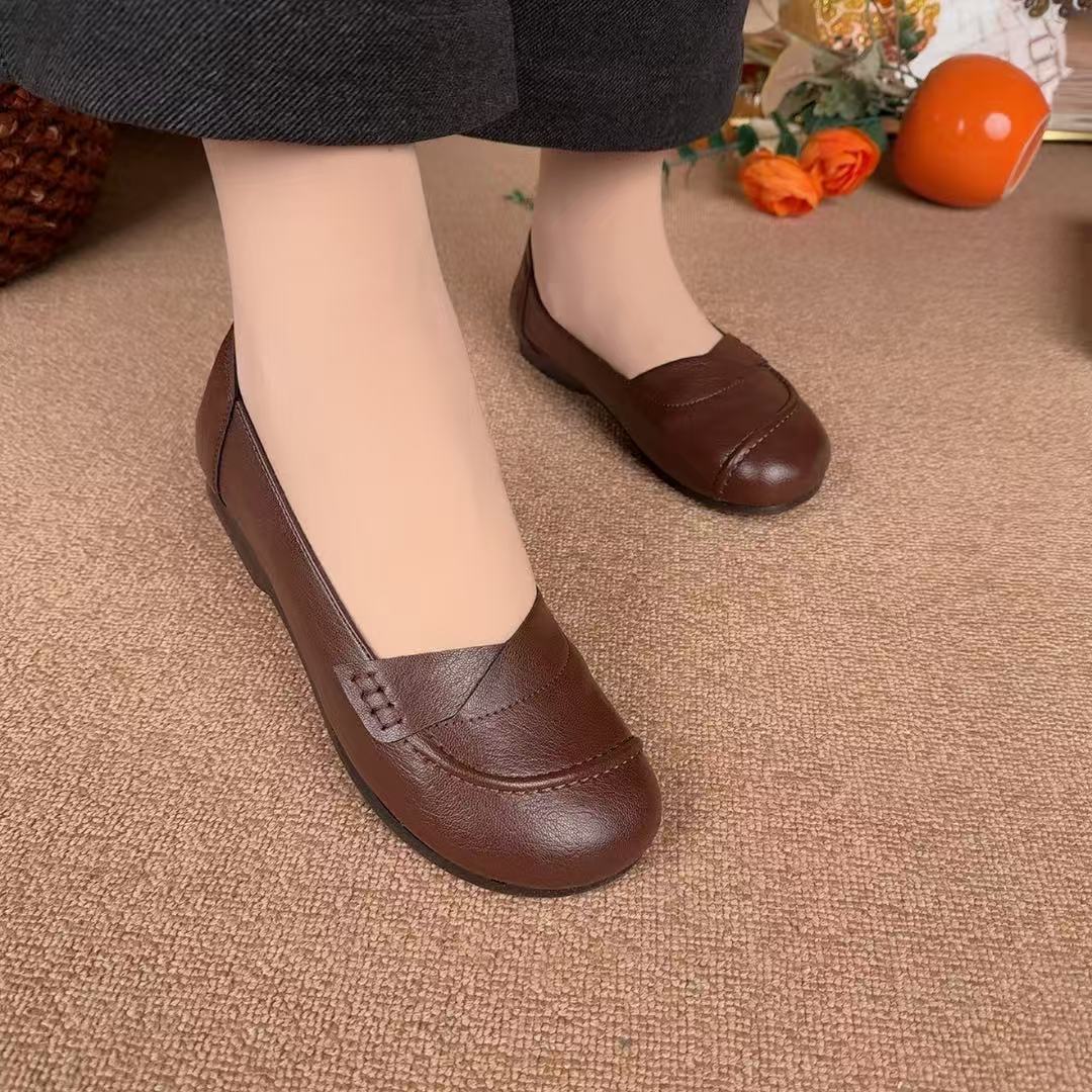 2026 primavera y verano nuevo estilo de moda versátil boca superficial cabeza redonda perezosa un pedazo de zapatos de madres de moda para mujeres